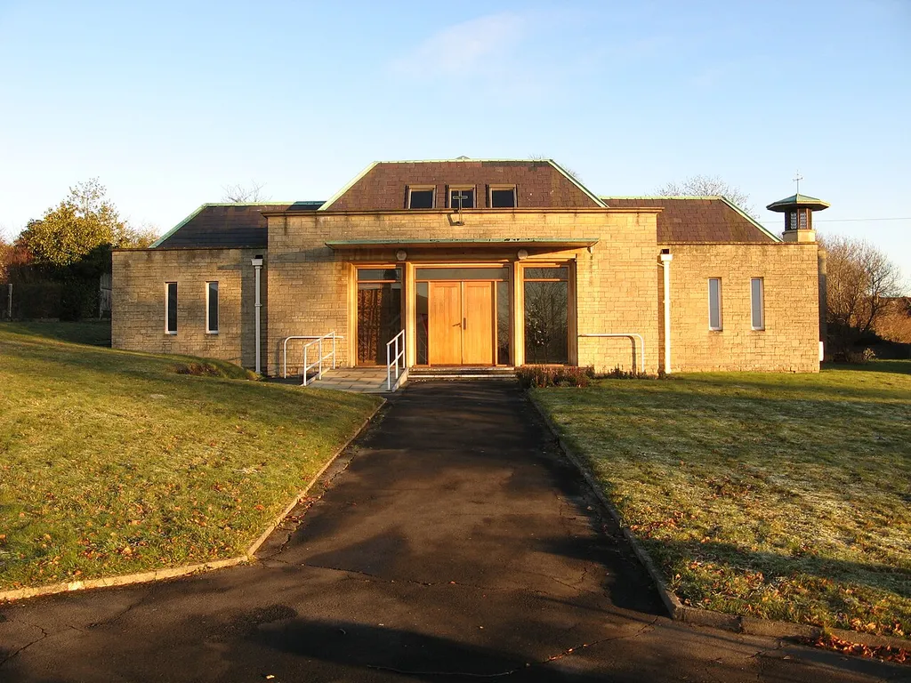 Emmanuel parish church, Apsley Road, Weston, Bath, Somerset, seen from the west. While in the parish of Weston, it is the electoral ward and locality of Newbridge rather than Weston. Built 1952-53 to replace a church consecrated in 1909 that suffered bomb damage in World War II.[1]