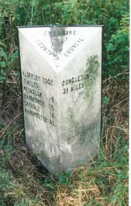 Milepost, S of Church