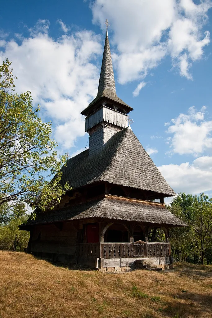 The old Barsana Wooden Church almost forgotten on top of the hill.