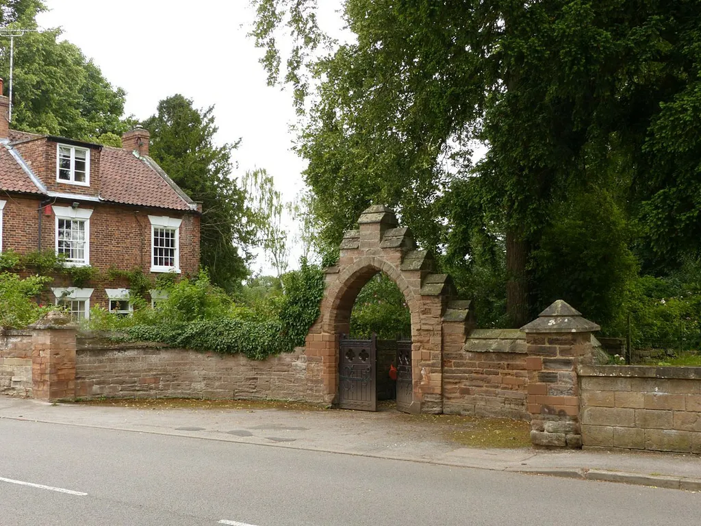 Photograph of the gateway to the church in Oxton, Nottinghamshire, England