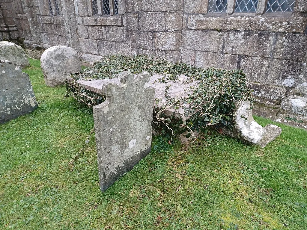 Anonymous chest tombs about 1.5 metres south of the South Aisle of the Church of St Constantine, Constantine, Cornwall, England. Late 17th century. Grade II listed.