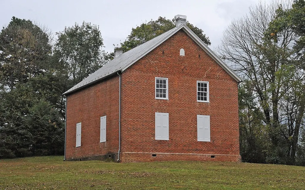 BUILT IN 1848 AS THE THIRD CHURCH ON THE SITE. SERVED UNTIL 1959