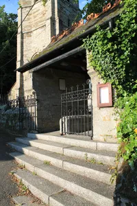 Lychgate And Attached Churchyard Walls To East And South Of Church Of St Gluvias