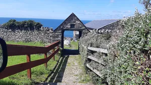 Lych gate and churchyard wall at Llangelynin church