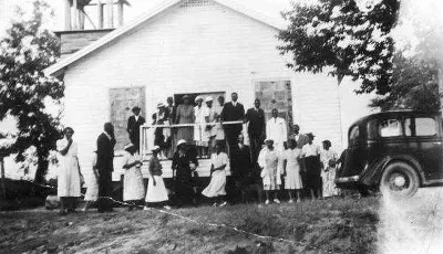 Local call number: Rc04430 Title: [Congregation at the Bethlehem Missionary Baptist Church : Belair, Florida] [graphic] Publication info: 19--. Physical descrip: 1 photoprint : b&amp;w ; 8 x 10 in. Series Title: (Reference collection) General Note: Founded in 1851 with Reverend James Page, Florida's first black minister. Built in 1937. General Note: Identified in the picture are (on porch L-R): 1. Herbert McKinnon, 3. Turner Hawkins, 4. Suwannee Lewis, 8. Reverend W.S. Lewis. Front row: 5. Eliza Blake, 9. Hattie Floyd, 12. Charity Shaw.