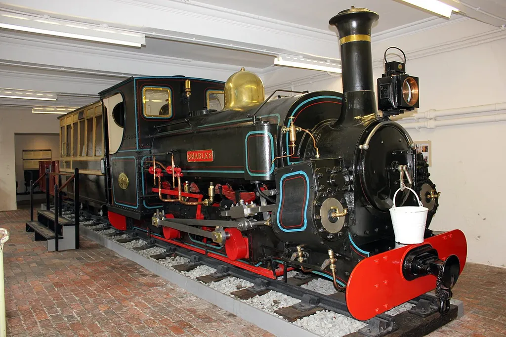 Charles at Penrhyn Castle. Charles is a saddle tank locomotive which has close connections with Penrhyn. Charles was one of the 'main line' engines used at Penrhyn Quarry. Built by Hunslet Engine Co of Leeds in 1882, Charles worked until the 1950s and after restoration was placed on permanent loan to the National Trust.