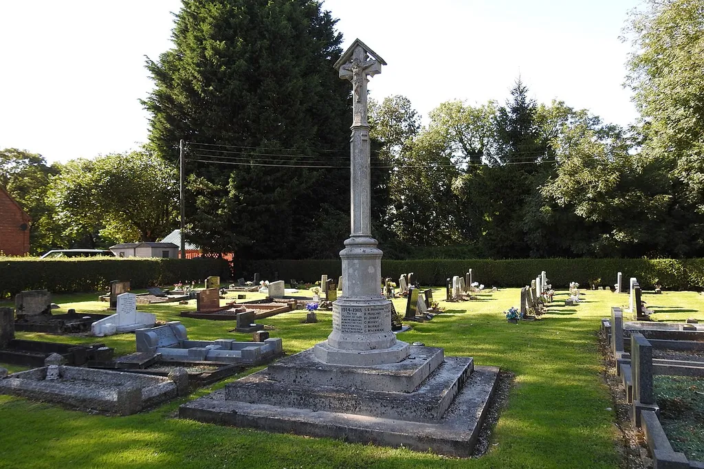 Dawsmere War Memorial in the churchyard