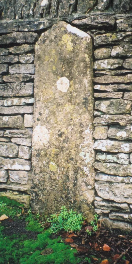 Milestone set into the boundary wall of Stoneleigh House, Station Road, Brize Norton, Oxfordshire