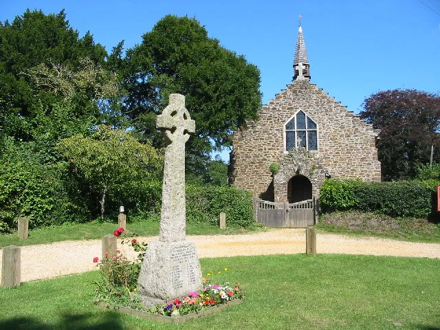 Parish church of St James, Alderholt, Dorset, seen from the west, with the parish war memorial in the foreground