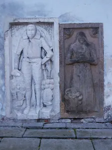 Tombstones on the wall of St. Wenceslas church in Rudník
