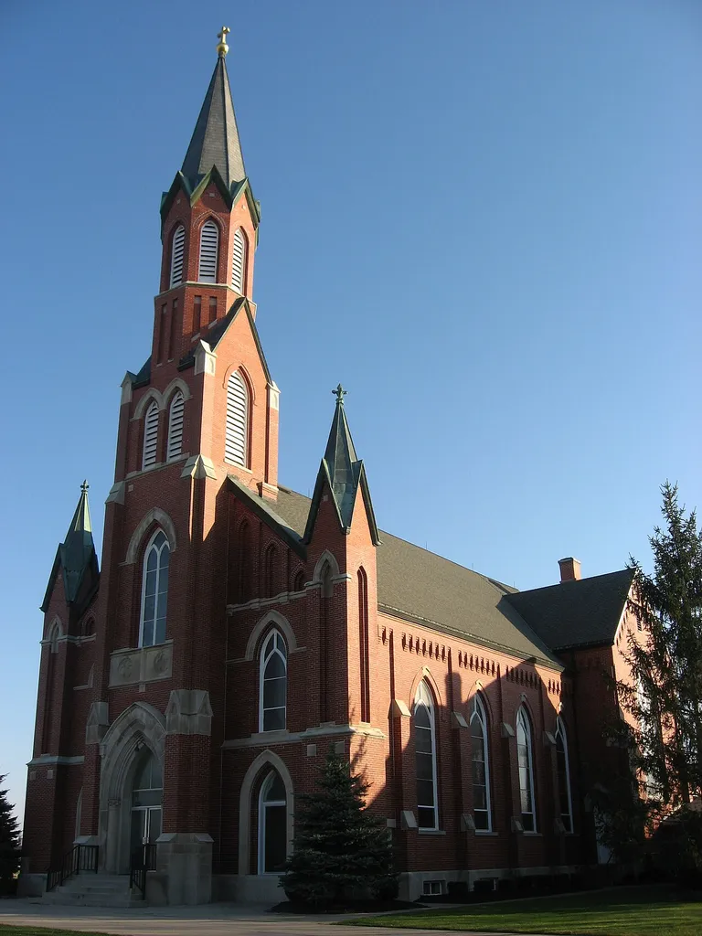 Front of St. Rose Roman Catholic Church, located along State Route 119 in Cassella, an unincorporated community in Marion Township, Mercer County, Ohio, United States. Built in 1892, the church, its rectory, and an associated school were listed together on the National Register of Historic Places as a part of the Cross-Tipped Churches of Ohio Thematic Resources.
