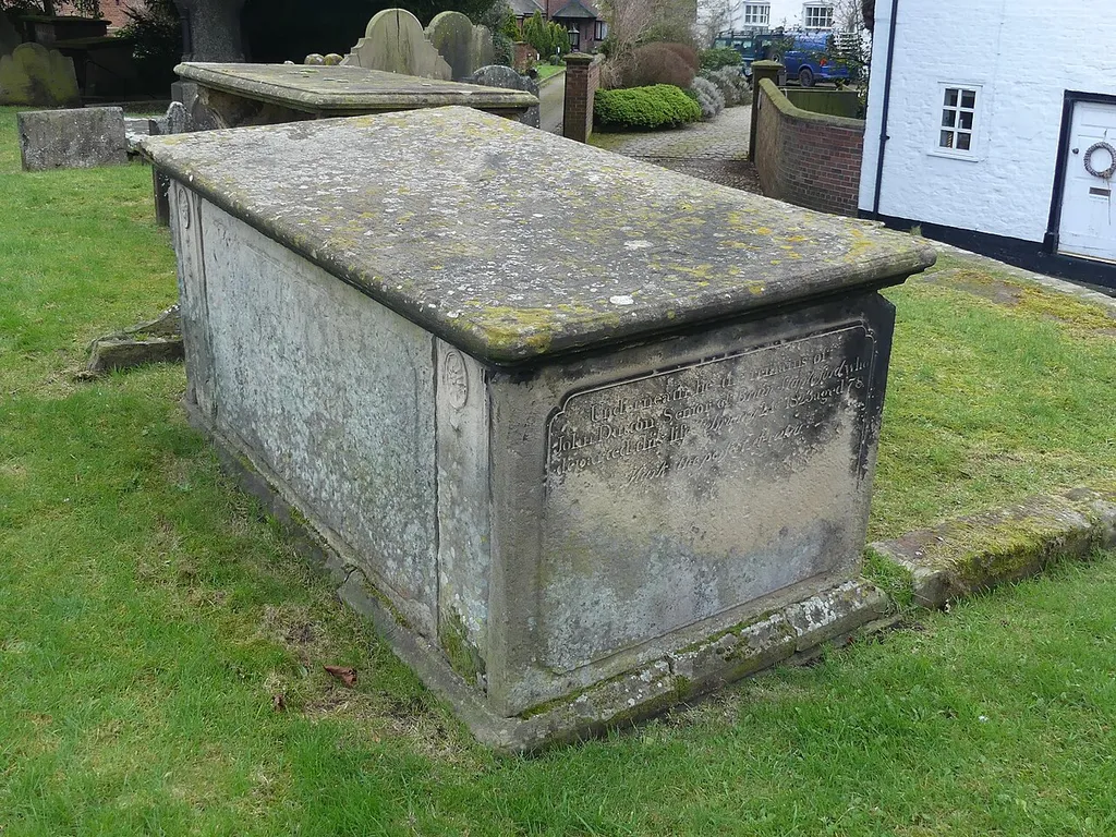 Grade II listed building in Tarvin, Cheshire: listed as "Tombchest of John Minshull and daughter, south-west corner of churchyard of St. Andrew" .mw-parser-output .messagebox{margin:4px 0;width:auto;border-collapse:collapse;border:2px solid var(--border-color-progressive,#6485d1);background-color:var(--background-color-neutral-subtle,#fbfcff);color:var(--color-base,#202122);box-sizing:border-box;border-inline-start-width:8px}.mw-parser-output .messagebox.mbox-small{font-size:88%;line-height:1.25em}.mw-parser-output .mbox-warning,.mw-parser-output .mbox-speedy{border:2px solid var(--border-color-error,#b22222);background:var(--background-color-error-subtle,#ffdbdb);border-inline-start-width:8px}.mw-parser-output .mbox-serious,.mw-parser-output .mbox-delete,.mw-parser-output .mbox-stop{border:2px solid var(--border-color-error,#b22222);border-inline-start-width:8px}.mw-parser-output .mbox-issue,.mw-parser-output .mbox-content{border:2px solid #f28500;background:var(--background-color-warning-subtle,#ffe);border-inline-start-width:8px}.mw-parser-output .mbox-query,.mw-parser-output .mbox-style{border:2px solid #f4c430;background:var(--background-color-warning-subtle,#ffe);border-inline-start-width:8px}.mw-parser-output .mbox-shit{border:2px solid #960;border-inline-start-width:8px}.mw-parser-output .mbox-license{border:2px solid #88a;border-inline-start-width:initial}.mw-parser-output .mbox-legal{border:2px solid var(--border-color-notice,#666);background:var(--background-color-base,#fff);border-inline-start-width:8px}.mw-parser-output .mbox-honor{border:2px solid #ca3;background:var(--background-color-warning-subtle,#fcf4db);border-inline-start-width:8px}.mw-parser-output .mbox-growth{border:2px solid #8d4;background:var(--background-color-success-subtle,#d5fdf4);border-inline-start-width:8px}.mw-parser-output .mbox-move{border:2px solid #93c;border-inline-start-width:8px}.mw-parser-output .mbox-protection,.mw-parser-output .mbox-message{border:2px solid var(--border-
