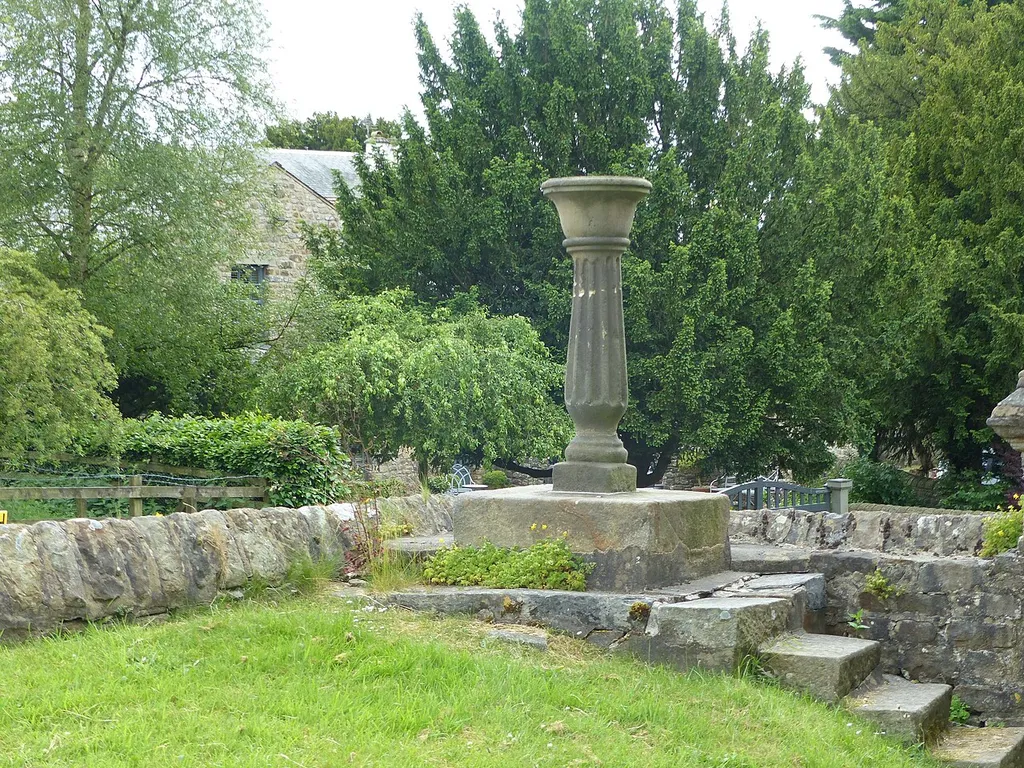Sundial base in south west corner of churchyard, Church of St Peter and St Paul: Grade II listed sundial in Bolton-by-Bowland, Lancashire. .mw-parser-output .messagebox{margin:4px 0;width:auto;border-collapse:collapse;border:2px solid var(--border-color-progressive,#6485d1);background-color:var(--background-color-neutral-subtle,#fbfcff);color:var(--color-base,#202122);box-sizing:border-box;border-inline-start-width:8px}.mw-parser-output .messagebox.mbox-small{font-size:88%;line-height:1.25em}.mw-parser-output .mbox-warning,.mw-parser-output .mbox-speedy{border:2px solid var(--border-color-error,#b22222);background:var(--background-color-error-subtle,#ffdbdb);border-inline-start-width:8px}.mw-parser-output .mbox-serious,.mw-parser-output .mbox-delete,.mw-parser-output .mbox-stop{border:2px solid var(--border-color-error,#b22222);border-inline-start-width:8px}.mw-parser-output .mbox-issue,.mw-parser-output .mbox-content{border:2px solid #f28500;background:var(--background-color-warning-subtle,#ffe);border-inline-start-width:8px}.mw-parser-output .mbox-query,.mw-parser-output .mbox-style{border:2px solid #f4c430;background:var(--background-color-warning-subtle,#ffe);border-inline-start-width:8px}.mw-parser-output .mbox-shit{border:2px solid #960;border-inline-start-width:8px}.mw-parser-output .mbox-license{border:2px solid #88a;border-inline-start-width:initial}.mw-parser-output .mbox-legal{border:2px solid var(--border-color-notice,#666);background:var(--background-color-base,#fff);border-inline-start-width:8px}.mw-parser-output .mbox-honor{border:2px solid #ca3;background:var(--background-color-warning-subtle,#fcf4db);border-inline-start-width:8px}.mw-parser-output .mbox-growth{border:2px solid #8d4;background:var(--background-color-success-subtle,#d5fdf4);border-inline-start-width:8px}.mw-parser-output .mbox-move{border:2px solid #93c;border-inline-start-width:8px}.mw-parser-output .mbox-protection,.mw-parser-output .mbox-message{border:2px solid var(--border-color-