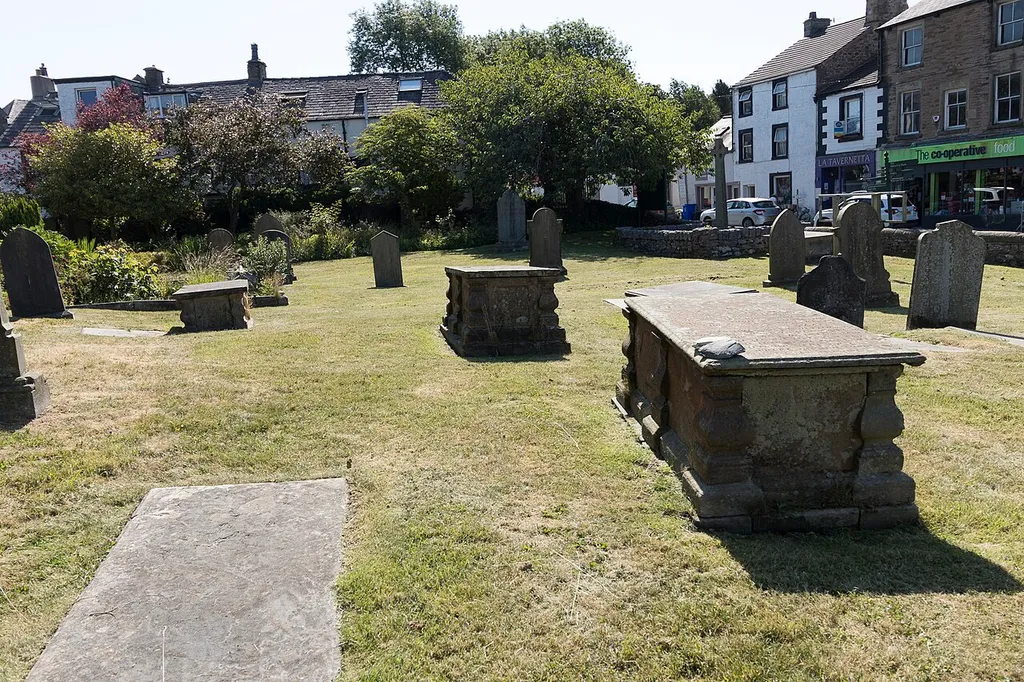 Three Chest Tombs In Churchyard To South Of Entrance To Church Of St Mary .mw-parser-output .messagebox{margin:4px 0;width:auto;border-collapse:collapse;border:2px solid var(--border-color-progressive,#6485d1);background-color:var(--background-color-neutral-subtle,#fbfcff);color:var(--color-base,#202122);box-sizing:border-box;border-inline-start-width:8px}.mw-parser-output .messagebox.mbox-small{font-size:88%;line-height:1.25em}.mw-parser-output .mbox-warning,.mw-parser-output .mbox-speedy{border:2px solid var(--border-color-error,#b22222);background:var(--background-color-error-subtle,#ffdbdb);border-inline-start-width:8px}.mw-parser-output .mbox-serious,.mw-parser-output .mbox-delete,.mw-parser-output .mbox-stop{border:2px solid var(--border-color-error,#b22222);border-inline-start-width:8px}.mw-parser-output .mbox-issue,.mw-parser-output .mbox-content{border:2px solid #f28500;background:var(--background-color-warning-subtle,#ffe);border-inline-start-width:8px}.mw-parser-output .mbox-query,.mw-parser-output .mbox-style{border:2px solid #f4c430;background:var(--background-color-warning-subtle,#ffe);border-inline-start-width:8px}.mw-parser-output .mbox-shit{border:2px solid #960;border-inline-start-width:8px}.mw-parser-output .mbox-license{border:2px solid #88a;border-inline-start-width:initial}.mw-parser-output .mbox-legal{border:2px solid var(--border-color-notice,#666);background:var(--background-color-base,#fff);border-inline-start-width:8px}.mw-parser-output .mbox-honor{border:2px solid #ca3;background:var(--background-color-warning-subtle,#fcf4db);border-inline-start-width:8px}.mw-parser-output .mbox-growth{border:2px solid #8d4;background:var(--background-color-success-subtle,#d5fdf4);border-inline-start-width:8px}.mw-parser-output .mbox-move{border:2px solid #93c;border-inline-start-width:8px}.mw-parser-output .mbox-protection,.mw-parser-output .mbox-message{border:2px solid var(--border-color-base,#aaa);border-inline-start-width:8px}.mw-parser-output .messa
