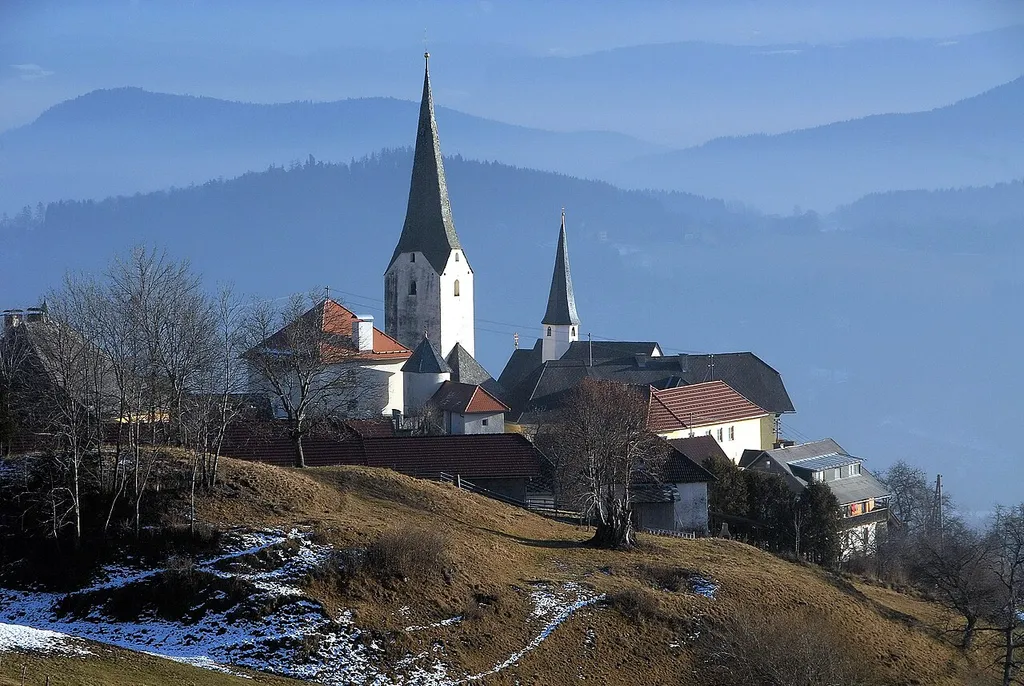 Northwestern view of the village with parish church Saint Martin in Sörg #12, market town Liebenfels, district Sankt Veit, Carinthia, Austria, EU