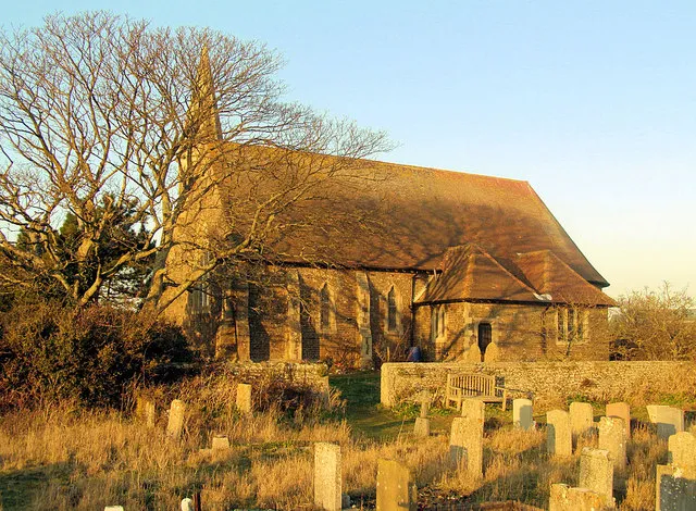 Church of the Holy Spirit, Rye Harbour The church was designed by London architect Samuel Sanders Tenlon in 1849. According to the guide, the church is made from blue stone but when I visited late on a sunny December evening, the setting sun made the church a golden honey colour.