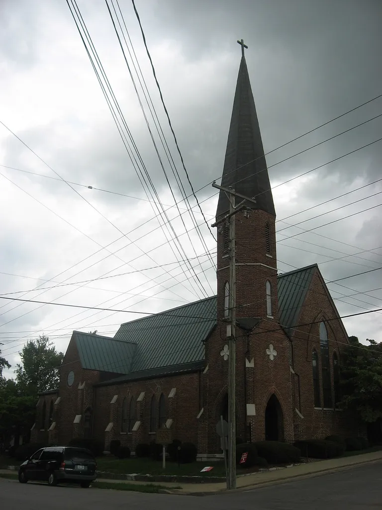 Front and western side of St. Philip's Episcopal Church, located on the northeastern corner of the intersection of Short and Chiles Streets in Harrodsburg, Kentucky, United States. Built in 1860, it is listed on the National Register of Historic Places.