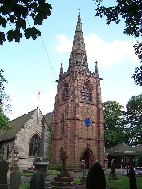 St Margaret's parish church, Great Barr, West Midlands (formerly Staffordshire). The tower was built of brick in 1677, but this is completely hidden by a Gothic revival red sandstone casing added in 1893. The spire is 18th-century.