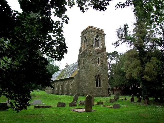 St Mary, Harrington Not the best day for photographing this church, but I had to make the best of it, as it was my third visit. I found the best shot of the church at this angle, was at arms length above my head, (about 7ft 6ins from ground level) otherwise the sloping verticals were too much. The church of St Mary was almost completely rebuilt in 1854-5, of Somersby sandstone and Ancaster stone. With public subscription and at his own expense, the Reverend Robert Wentworth Cracroft commissioned S S Teulon, the architect, to replace the former church at a cost of £1,000. There is an effigy of a recumbent knight near the pulpit. The font dates from the 15th-century and this, together with an ancient poppy-headed bench in the chancel, also date from an earlier building. There are monuments to the Copeldikes/Amcotts (the last Copeldike being of 1658.) and a brass of c1480. The original tower arch supports 3 bells and a ting tang (a small ceiling bell) dated 1814. The Parish register dates from 1697. The church seats about 200. In just over 100 years the population of Harrington has dwindled from 123 to about 40. The next Harrington Hall Garden Open Day is on Sunday 24th June 2007 2-5pm.