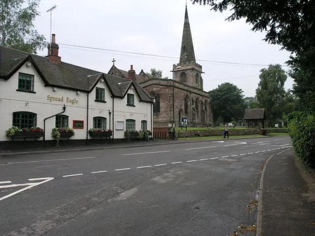 Rolleston on Dove Original description: Spread Eagle and St Mary's The church in Rolleston on Dove is dedicated to St Mary. The Spread Eagle pub next door shares some of its architecture with many railway buildings.