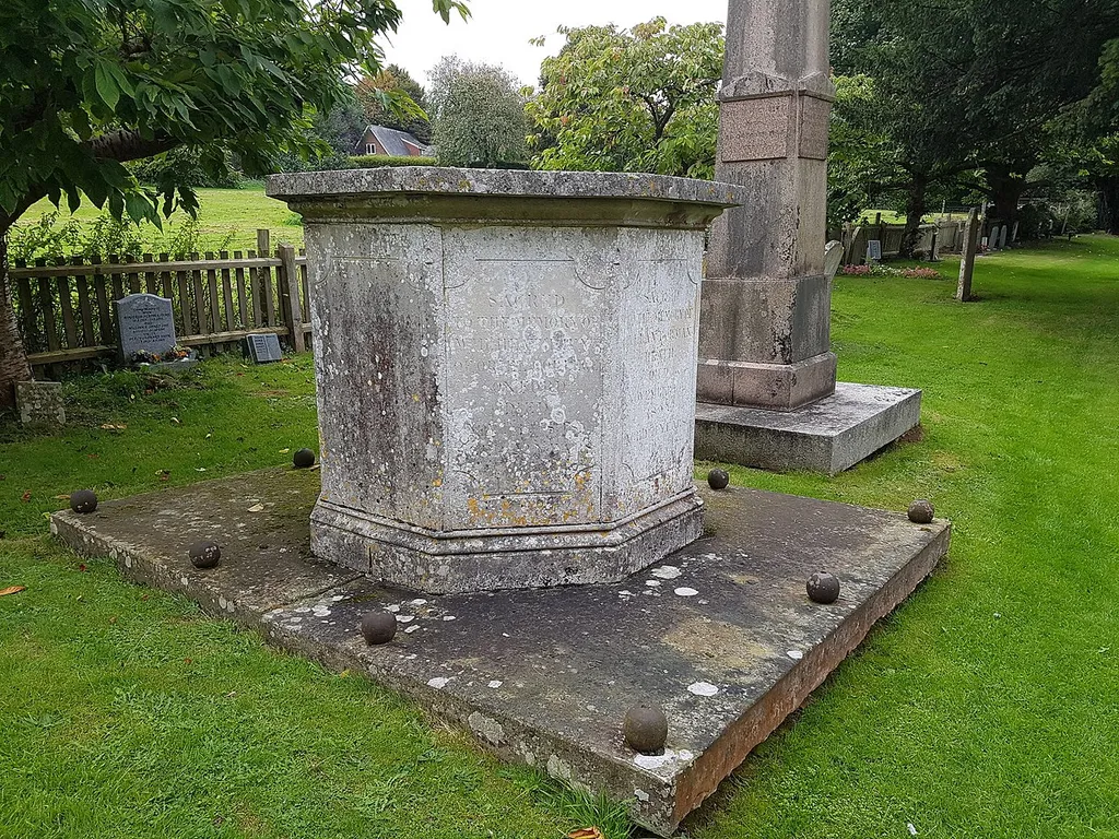 Table Tomb 3 Metres North West Of Holy Trinity Church .mw-parser-output .messagebox{margin:4px 0;width:auto;border-collapse:collapse;border:2px solid var(--border-color-progressive,#6485d1);background-color:var(--background-color-neutral-subtle,#fbfcff);color:var(--color-base,#202122);box-sizing:border-box;border-inline-start-width:8px}.mw-parser-output .messagebox.mbox-small{font-size:88%;line-height:1.25em}.mw-parser-output .mbox-warning,.mw-parser-output .mbox-speedy{border:2px solid var(--border-color-error,#b22222);background:var(--background-color-error-subtle,#ffdbdb);border-inline-start-width:8px}.mw-parser-output .mbox-serious,.mw-parser-output .mbox-delete,.mw-parser-output .mbox-stop{border:2px solid var(--border-color-error,#b22222);border-inline-start-width:8px}.mw-parser-output .mbox-issue,.mw-parser-output .mbox-content{border:2px solid #f28500;background:var(--background-color-warning-subtle,#ffe);border-inline-start-width:8px}.mw-parser-output .mbox-query,.mw-parser-output .mbox-style{border:2px solid #f4c430;background:var(--background-color-warning-subtle,#ffe);border-inline-start-width:8px}.mw-parser-output .mbox-shit{border:2px solid #960;border-inline-start-width:8px}.mw-parser-output .mbox-license{border:2px solid #88a;border-inline-start-width:initial}.mw-parser-output .mbox-legal{border:2px solid var(--border-color-notice,#666);background:var(--background-color-base,#fff);border-inline-start-width:8px}.mw-parser-output .mbox-honor{border:2px solid #ca3;background:var(--background-color-warning-subtle,#fcf4db);border-inline-start-width:8px}.mw-parser-output .mbox-growth{border:2px solid #8d4;background:var(--background-color-success-subtle,#d5fdf4);border-inline-start-width:8px}.mw-parser-output .mbox-move{border:2px solid #93c;border-inline-start-width:8px}.mw-parser-output .mbox-protection,.mw-parser-output .mbox-message{border:2px solid var(--border-color-base,#aaa);border-inline-start-width:8px}.mw-parser-output .messagebox .mbox-text{bor