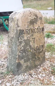 Milestone, by Frenchfields ornamental fish shop (was Acorn End), E of Acorn railway bridge