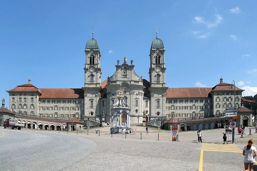 The Einsiedeln abbey is a Benedictine monastery of considerable size. It's not easy to bring the whole front on a picture. When I had everything on the photo without being hit by a car, there were still those converging lines. But these distortions I was able to correct with the freeware ShiftN. Canton of Schwyz, Switzerland, August 10, 2010.