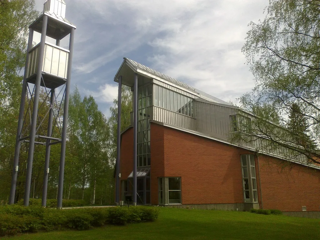 Church of Resurrection is the new church of Juankoski, Finland. Evangelical Lutheran Church. Architects: Karvala and Silvennoinen. 1990. Seats 300.