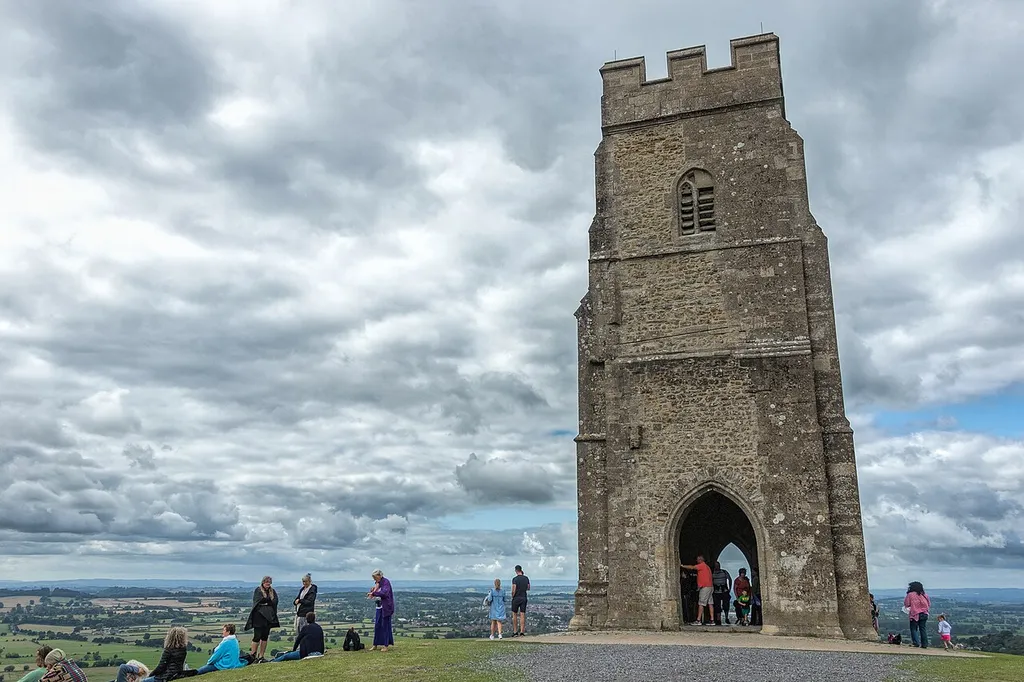 St Michael's Church, monastic remains, and other settlement remains on Glastonbury Tor .mw-parser-output .messagebox{margin:4px 0;width:auto;border-collapse:collapse;border:2px solid var(--border-color-progressive,#6485d1);background-color:var(--background-color-neutral-subtle,#fbfcff);color:var(--color-base,#202122);box-sizing:border-box;border-inline-start-width:8px}.mw-parser-output .messagebox.mbox-small{font-size:88%;line-height:1.25em}.mw-parser-output .mbox-warning,.mw-parser-output .mbox-speedy{border:2px solid var(--border-color-error,#b22222);background:var(--background-color-error-subtle,#ffdbdb);border-inline-start-width:8px}.mw-parser-output .mbox-serious,.mw-parser-output .mbox-delete,.mw-parser-output .mbox-stop{border:2px solid var(--border-color-error,#b22222);border-inline-start-width:8px}.mw-parser-output .mbox-issue,.mw-parser-output .mbox-content{border:2px solid #f28500;background:var(--background-color-warning-subtle,#ffe);border-inline-start-width:8px}.mw-parser-output .mbox-query,.mw-parser-output .mbox-style{border:2px solid #f4c430;background:var(--background-color-warning-subtle,#ffe);border-inline-start-width:8px}.mw-parser-output .mbox-shit{border:2px solid #960;border-inline-start-width:8px}.mw-parser-output .mbox-license{border:2px solid #88a;border-inline-start-width:initial}.mw-parser-output .mbox-legal{border:2px solid var(--border-color-notice,#666);background:var(--background-color-base,#fff);border-inline-start-width:8px}.mw-parser-output .mbox-honor{border:2px solid #ca3;background:var(--background-color-warning-subtle,#fcf4db);border-inline-start-width:8px}.mw-parser-output .mbox-growth{border:2px solid #8d4;background:var(--background-color-success-subtle,#d5fdf4);border-inline-start-width:8px}.mw-parser-output .mbox-move{border:2px solid #93c;border-inline-start-width:8px}.mw-parser-output .mbox-protection,.mw-parser-output .mbox-message{border:2px solid var(--border-color-base,#aaa);border-inline-start-width:8px}.mw-parser-