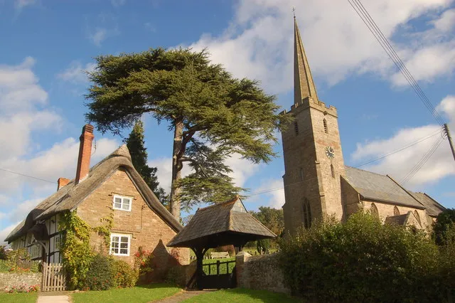 Church cottage (left) and St Lawrence's parish church (right), Stretton Grandison, Herefordshire, seen from the southwest