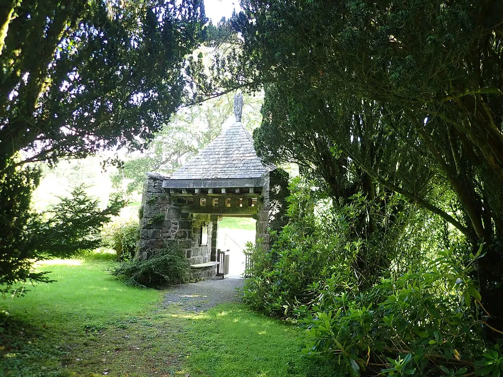 Lychgate, St Paul's Church. Elaborate stone lychgate in Arts &amp; Crafts style. Dated 1906, it was erected in memory of Charles Edward Jones-Owen of Hengwrt Ucha by his friends, tenants and employees.