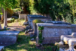 Row Of 10 Chest Tombs And One Table Tomb Against The South East Of Churchyard Wall Of The Church Of St John The Baptist