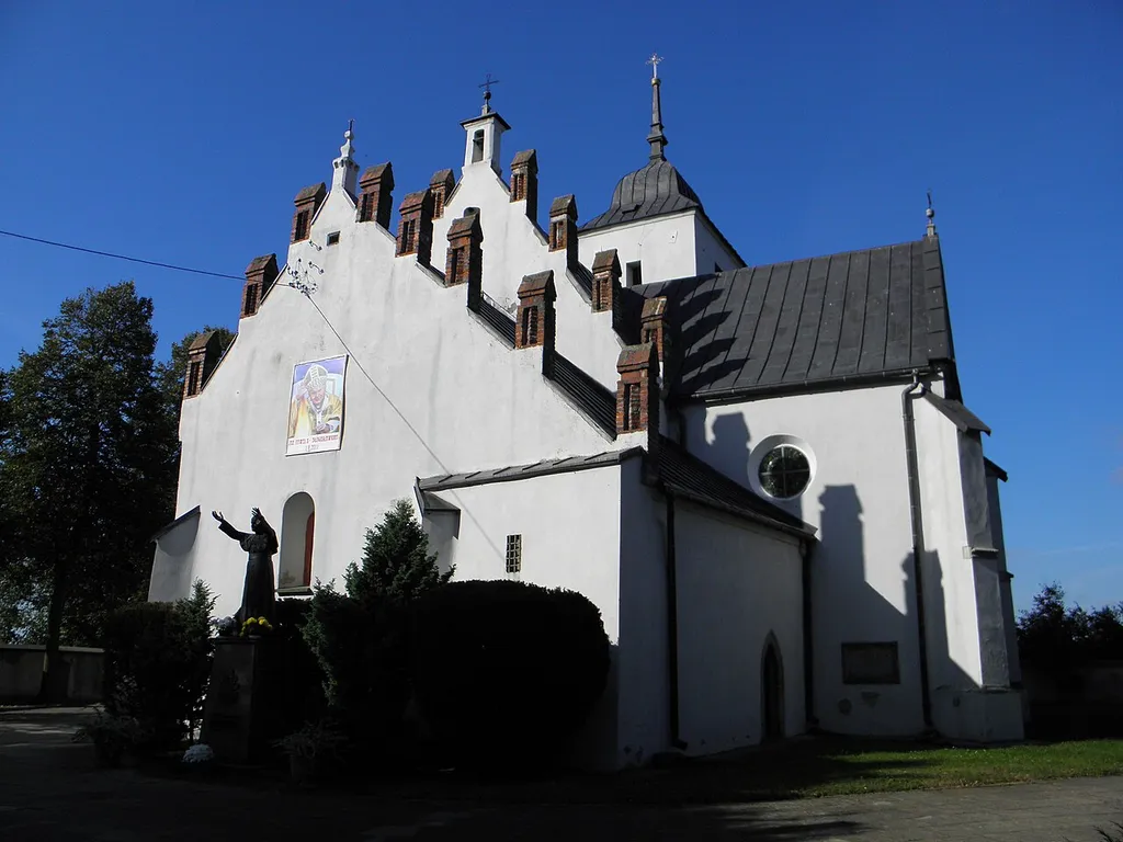 Kościół pod parafii pod wezwaniem Św. Jana Chrzciciela we Włostowie. Pierwotne założenie późnoromańskie (XIII/XIVw), wielokrotnie przebudowywane.