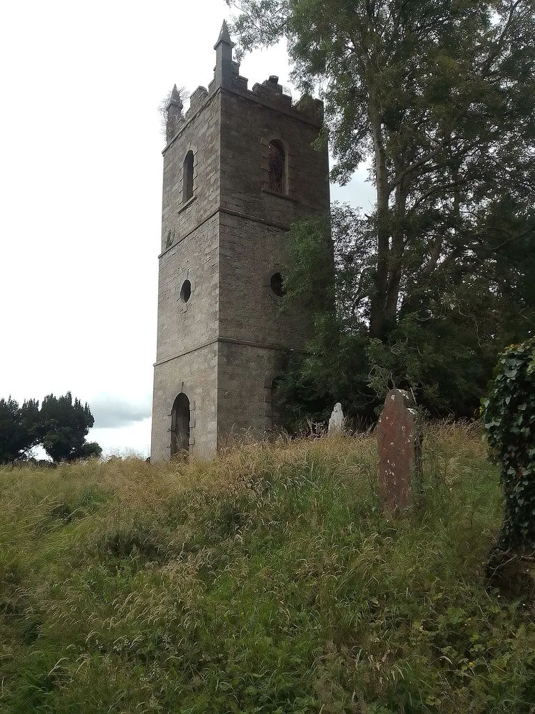 The church was founded by St. Colmcille in the 6th Century, and lies approximately 1.5km south of the rock at Ballymote just beyond the end of the Ballymore Heritage Trail The 3 storey square tower remains intact and roofless with the entrance door on the west face. The main body of the church is also roofless and heavily overgrown with vegetation inside, attempts to clear it in 2010s being thwarted. The church is surrounded by star shape fortifications dating from about 1600 and was adopted by the Church of Ireland as a parish church circa 1750 then abandoned about 1830 when when a new church was constructed in Ballymote.