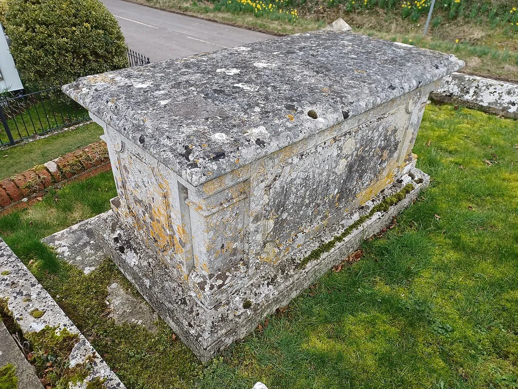 Table Tomb 12 Metres North Of Church Of All Saints, Barton Stacey, Hampshire, England. Early 19th century, Grade II listed. .mw-parser-output .messagebox{margin:4px 0;width:auto;border-collapse:collapse;border:2px solid var(--border-color-progressive,#6485d1);background-color:var(--background-color-neutral-subtle,#fbfcff);color:var(--color-base,#202122);box-sizing:border-box;border-inline-start-width:8px}.mw-parser-output .messagebox.mbox-small{font-size:88%;line-height:1.25em}.mw-parser-output .mbox-warning,.mw-parser-output .mbox-speedy{border:2px solid var(--border-color-error,#b22222);background:var(--background-color-error-subtle,#ffdbdb);border-inline-start-width:8px}.mw-parser-output .mbox-serious,.mw-parser-output .mbox-delete,.mw-parser-output .mbox-stop{border:2px solid var(--border-color-error,#b22222);border-inline-start-width:8px}.mw-parser-output .mbox-issue,.mw-parser-output .mbox-content{border:2px solid #f28500;background:var(--background-color-warning-subtle,#ffe);border-inline-start-width:8px}.mw-parser-output .mbox-query,.mw-parser-output .mbox-style{border:2px solid #f4c430;background:var(--background-color-warning-subtle,#ffe);border-inline-start-width:8px}.mw-parser-output .mbox-shit{border:2px solid #960;border-inline-start-width:8px}.mw-parser-output .mbox-license{border:2px solid #88a;border-inline-start-width:initial}.mw-parser-output .mbox-legal{border:2px solid var(--border-color-notice,#666);background:var(--background-color-base,#fff);border-inline-start-width:8px}.mw-parser-output .mbox-honor{border:2px solid #ca3;background:var(--background-color-warning-subtle,#fcf4db);border-inline-start-width:8px}.mw-parser-output .mbox-growth{border:2px solid #8d4;background:var(--background-color-success-subtle,#d5fdf4);border-inline-start-width:8px}.mw-parser-output .mbox-move{border:2px solid #93c;border-inline-start-width:8px}.mw-parser-output .mbox-protection,.mw-parser-output .mbox-message{border:2px solid var(--border-color-base,#aaa);bord