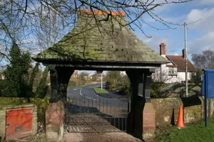 Lychgate canopy and wing walls, St Mary's Churchyard