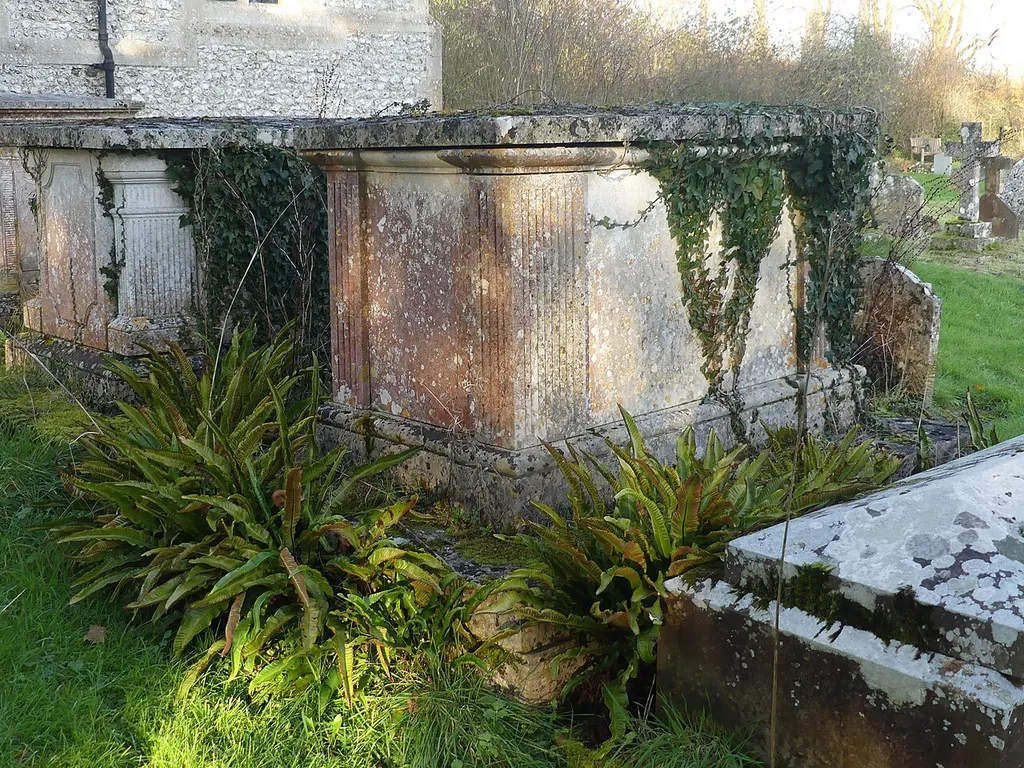 One of numerous listed table tombs in the churchyard of St Mary's Church, Monxton. Listed as "Table tomb 5 metres south of St Mary's Church". .mw-parser-output .messagebox{margin:4px 0;width:auto;border-collapse:collapse;border:2px solid var(--border-color-progressive,#6485d1);background-color:var(--background-color-neutral-subtle,#fbfcff);color:var(--color-base,#202122);box-sizing:border-box;border-inline-start-width:8px}.mw-parser-output .messagebox.mbox-small{font-size:88%;line-height:1.25em}.mw-parser-output .mbox-warning,.mw-parser-output .mbox-speedy{border:2px solid var(--border-color-error,#b22222);background:var(--background-color-error-subtle,#ffdbdb);border-inline-start-width:8px}.mw-parser-output .mbox-serious,.mw-parser-output .mbox-delete,.mw-parser-output .mbox-stop{border:2px solid var(--border-color-error,#b22222);border-inline-start-width:8px}.mw-parser-output .mbox-issue,.mw-parser-output .mbox-content{border:2px solid #f28500;background:var(--background-color-warning-subtle,#ffe);border-inline-start-width:8px}.mw-parser-output .mbox-query,.mw-parser-output .mbox-style{border:2px solid #f4c430;background:var(--background-color-warning-subtle,#ffe);border-inline-start-width:8px}.mw-parser-output .mbox-shit{border:2px solid #960;border-inline-start-width:8px}.mw-parser-output .mbox-license{border:2px solid #88a;border-inline-start-width:initial}.mw-parser-output .mbox-legal{border:2px solid var(--border-color-notice,#666);background:var(--background-color-base,#fff);border-inline-start-width:8px}.mw-parser-output .mbox-honor{border:2px solid #ca3;background:var(--background-color-warning-subtle,#fcf4db);border-inline-start-width:8px}.mw-parser-output .mbox-growth{border:2px solid #8d4;background:var(--background-color-success-subtle,#d5fdf4);border-inline-start-width:8px}.mw-parser-output .mbox-move{border:2px solid #93c;border-inline-start-width:8px}.mw-parser-output .mbox-protection,.mw-parser-output .mbox-message{border:2px solid var(--border-col