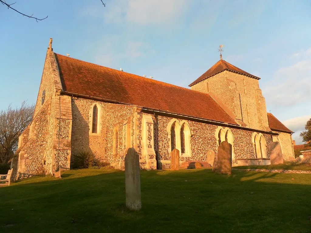St Margaret's Church, The Green, Rottingdean, City of Brighton and Hove, England. This ancient church is seen from the southwest in this view.
