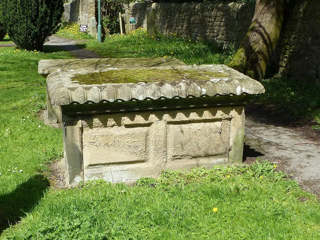 Churchyard tomb 12 metres south east of church porch: Grade II listed tomb in Eyam, Derbyshire .mw-parser-output .messagebox{margin:4px 0;width:auto;border-collapse:collapse;border:2px solid var(--border-color-progressive,#6485d1);background-color:var(--background-color-neutral-subtle,#fbfcff);color:var(--color-base,#202122);box-sizing:border-box;border-inline-start-width:8px}.mw-parser-output .messagebox.mbox-small{font-size:88%;line-height:1.25em}.mw-parser-output .mbox-warning,.mw-parser-output .mbox-speedy{border:2px solid var(--border-color-error,#b22222);background:var(--background-color-error-subtle,#ffdbdb);border-inline-start-width:8px}.mw-parser-output .mbox-serious,.mw-parser-output .mbox-delete,.mw-parser-output .mbox-stop{border:2px solid var(--border-color-error,#b22222);border-inline-start-width:8px}.mw-parser-output .mbox-issue,.mw-parser-output .mbox-content{border:2px solid #f28500;background:var(--background-color-warning-subtle,#ffe);border-inline-start-width:8px}.mw-parser-output .mbox-query,.mw-parser-output .mbox-style{border:2px solid #f4c430;background:var(--background-color-warning-subtle,#ffe);border-inline-start-width:8px}.mw-parser-output .mbox-shit{border:2px solid #960;border-inline-start-width:8px}.mw-parser-output .mbox-license{border:2px solid #88a;border-inline-start-width:initial}.mw-parser-output .mbox-legal{border:2px solid var(--border-color-notice,#666);background:var(--background-color-base,#fff);border-inline-start-width:8px}.mw-parser-output .mbox-honor{border:2px solid #ca3;background:var(--background-color-warning-subtle,#fcf4db);border-inline-start-width:8px}.mw-parser-output .mbox-growth{border:2px solid #8d4;background:var(--background-color-success-subtle,#d5fdf4);border-inline-start-width:8px}.mw-parser-output .mbox-move{border:2px solid #93c;border-inline-start-width:8px}.mw-parser-output .mbox-protection,.mw-parser-output .mbox-message{border:2px solid var(--border-color-base,#aaa);border-inline-start-width:8px}.mw