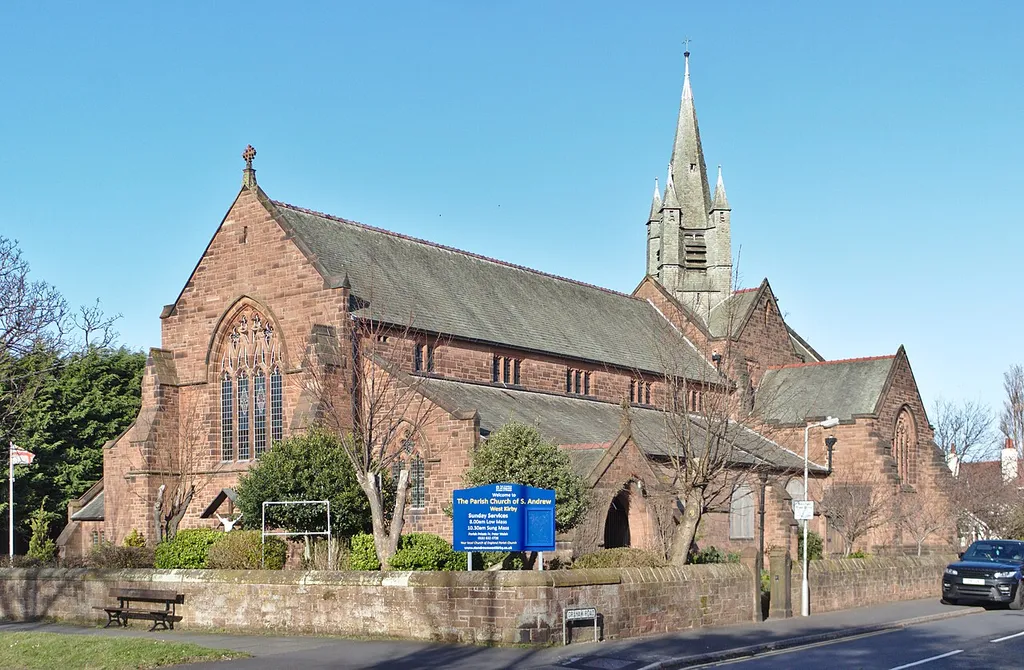 View of the west end and south elevation from across Meols Drive. The usual view of St Andrews, but probably the best.