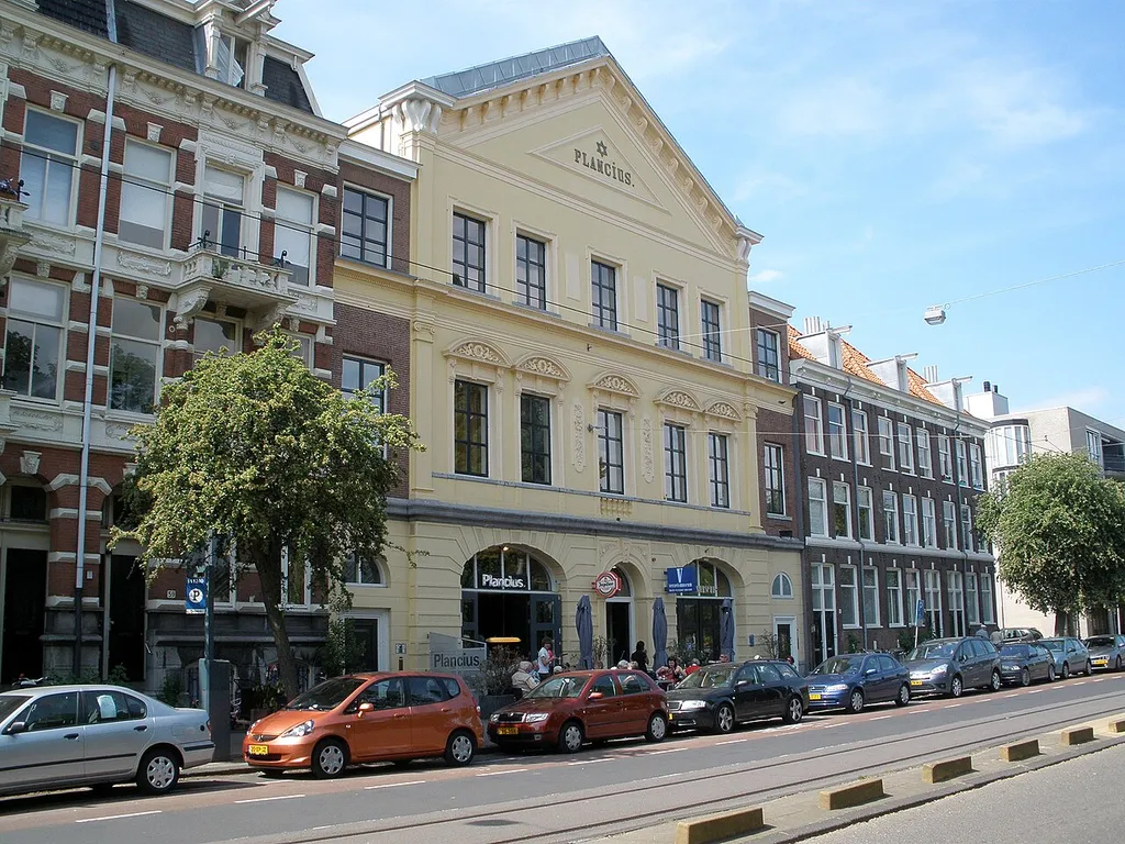 The Plancius building (1876), across from the main entrance to Artis zoo on Plantage Kerklaan in Amsterdam. This building, originally a choir hall and theatre for the Jewish community, now houses the Verzetsmuseum, dedicated to the Dutch resistance movement during World War II. In 2001 the building received rijksmonument (national monument) status. Note the Star of David on the facade.