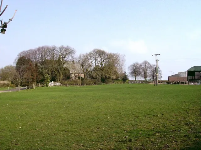 The former church parish of St Helen (left) and some of the buildings of Manor Farm (right), North Elkington, Lincolnshire