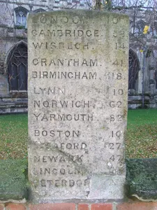 Milestone Erected In Churchyard Wall