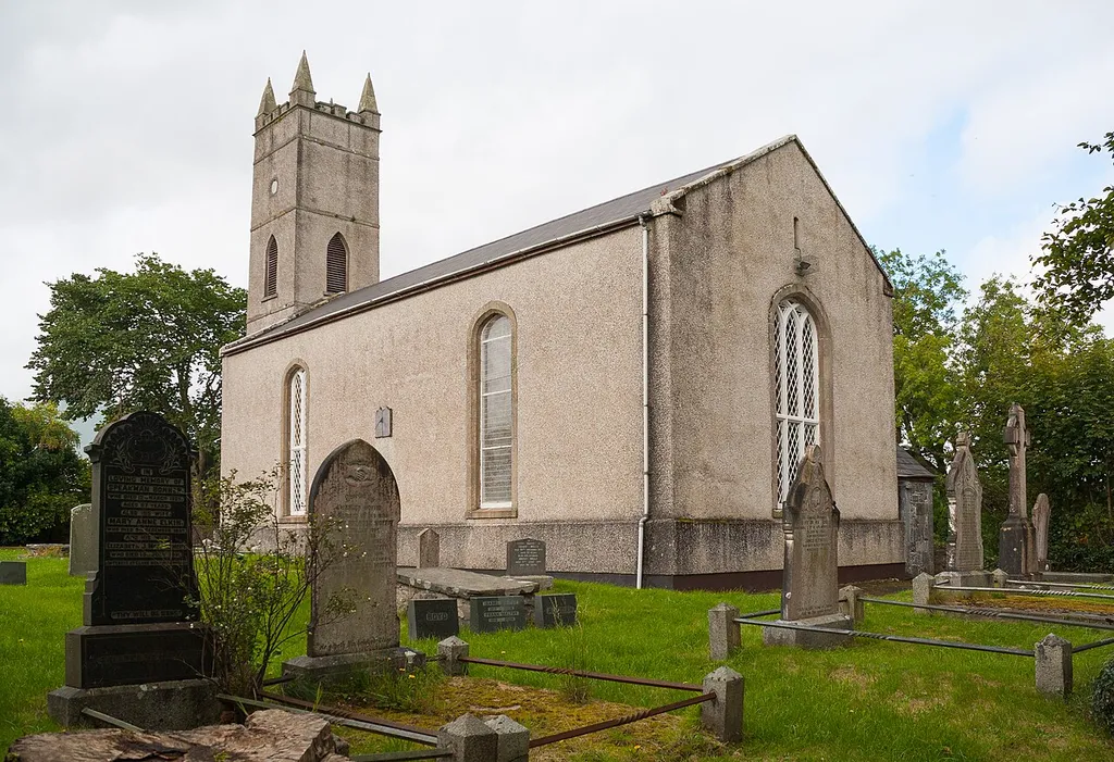 View from south-east of the simple tower-and-nave church.
