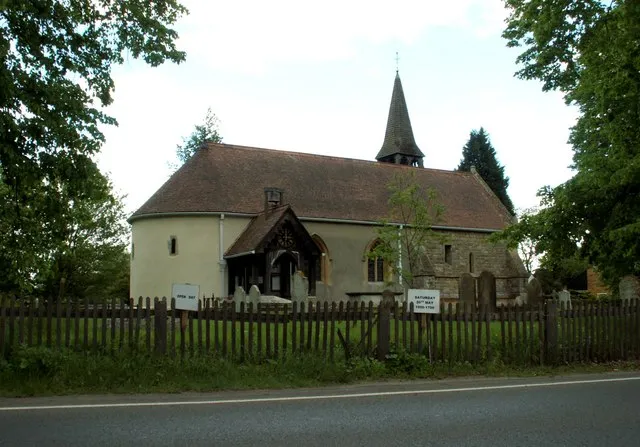 St Giles' parish church, Langford, Essex, seen from the southwest. The church used to have an apse at either end. The east apse has been replaced with a rectangular chancel, but the west apse survives.