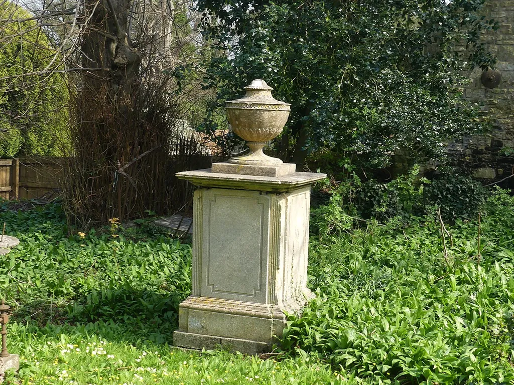 Unidentified monument, 2 metres south of Filmer Monument, in churchyard to north east of Holy Trinity Church: Grade II listed building in Newton St Loe, Somerset. .mw-parser-output .messagebox{margin:4px 0;width:auto;border-collapse:collapse;border:2px solid var(--border-color-progressive,#6485d1);background-color:var(--background-color-neutral-subtle,#fbfcff);color:var(--color-base,#202122);box-sizing:border-box;border-inline-start-width:8px}.mw-parser-output .messagebox.mbox-small{font-size:88%;line-height:1.25em}.mw-parser-output .mbox-warning,.mw-parser-output .mbox-speedy{border:2px solid var(--border-color-error,#b22222);background:var(--background-color-error-subtle,#ffdbdb);border-inline-start-width:8px}.mw-parser-output .mbox-serious,.mw-parser-output .mbox-delete,.mw-parser-output .mbox-stop{border:2px solid var(--border-color-error,#b22222);border-inline-start-width:8px}.mw-parser-output .mbox-issue,.mw-parser-output .mbox-content{border:2px solid #f28500;background:var(--background-color-warning-subtle,#ffe);border-inline-start-width:8px}.mw-parser-output .mbox-query,.mw-parser-output .mbox-style{border:2px solid #f4c430;background:var(--background-color-warning-subtle,#ffe);border-inline-start-width:8px}.mw-parser-output .mbox-shit{border:2px solid #960;border-inline-start-width:8px}.mw-parser-output .mbox-license{border:2px solid #88a;border-inline-start-width:initial}.mw-parser-output .mbox-legal{border:2px solid var(--border-color-notice,#666);background:var(--background-color-base,#fff);border-inline-start-width:8px}.mw-parser-output .mbox-honor{border:2px solid #ca3;background:var(--background-color-warning-subtle,#fcf4db);border-inline-start-width:8px}.mw-parser-output .mbox-growth{border:2px solid #8d4;background:var(--background-color-success-subtle,#d5fdf4);border-inline-start-width:8px}.mw-parser-output .mbox-move{border:2px solid #93c;border-inline-start-width:8px}.mw-parser-output .mbox-protection,.mw-parser-output .mbox-message{border:2px s
