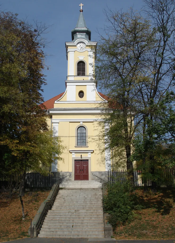St. Anne's Church. - This is a Roman Catholic parish church. Locally it is often referred to as "Red Church", because of its red roof. The church was built between 1816 and 1823, in late Baroque style with some Neoclassical elements; the altar and the pulpit are late Neoclassical. The first public clock of the city was in the church's tower. The rectangular sanctuary of this two naves church, covered with 'Czech-cap' vault. - Szent Anna tér, Miskolc