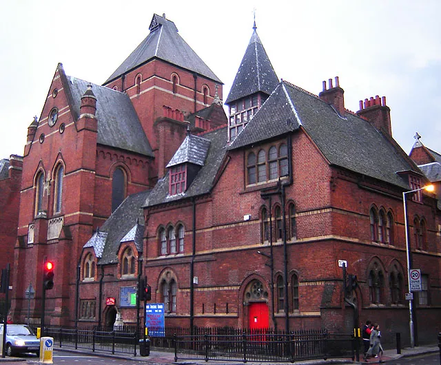 Christ Apostolic Church, Kingsland Road, Hackney. 21 February 2006. Photographer: Fin Fahey. This was St Columba's Anglican Church. Both the vicarage (foreground) and the church (background) are Grade I listed.