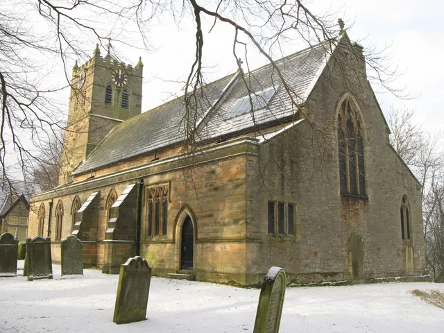 St Cuthbert's parish church, Allendale, Northumberland, seen from the southeast in snow