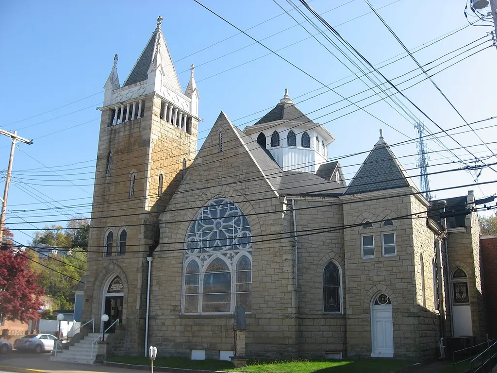 Front of the former First Presbyterian Church (now occupied by St. Patrick's Anglican Church, ACNA), located at 946 Market Street in Parkersburg, West Virginia, United States. Built in 1894, it is listed on the National Register of Historic Places, and it is part of a Register-listed historic district, the Avery Street Historic District.